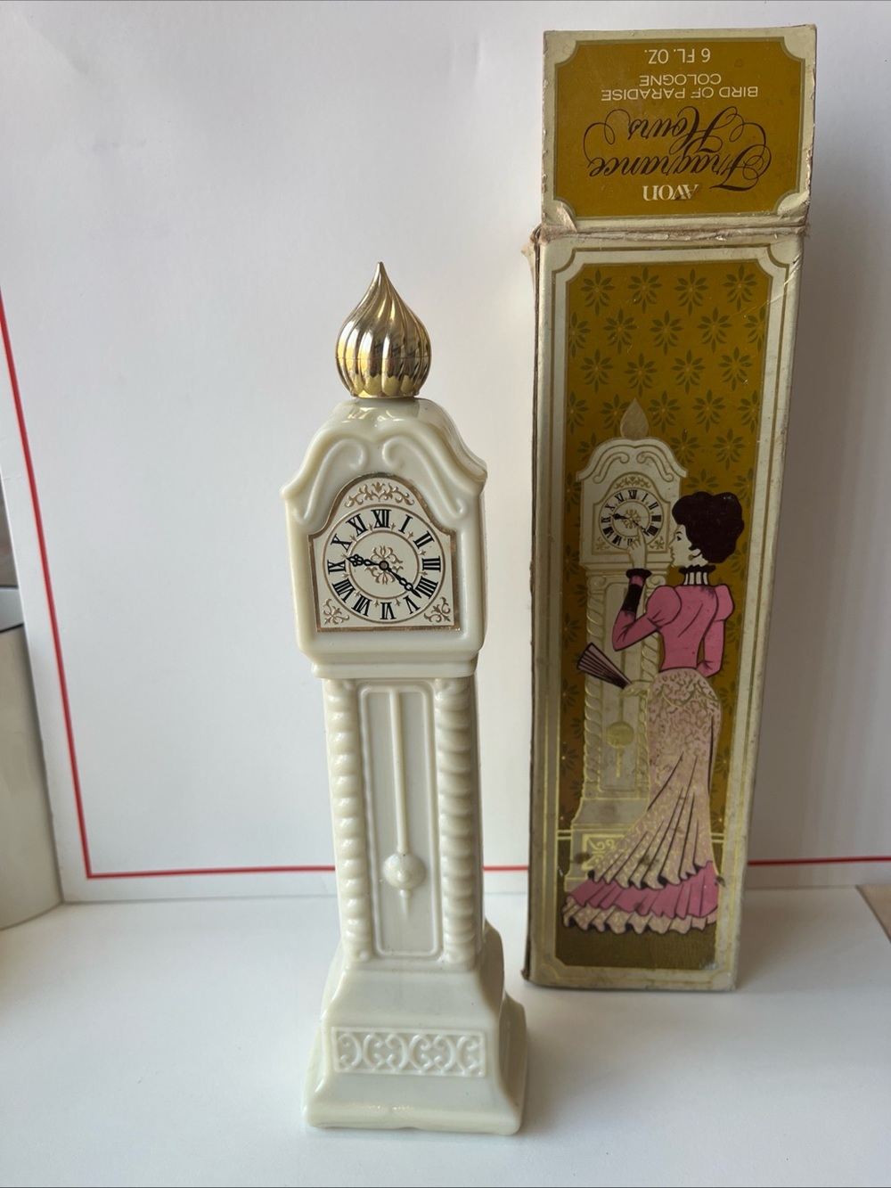 VTG Avon milk glass grandfather clock bird of paradise cologne fragrance hours